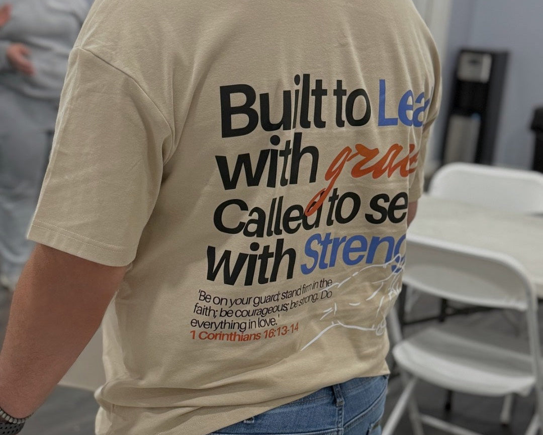 Built to Lead with Grace | Father's Day Christian T-Shirt – Dad and Daughter Silhouette in Orange and Blue – Nude Oversized Tee